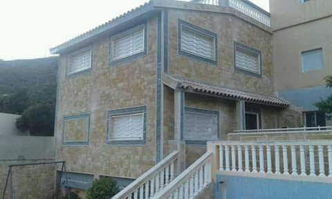 Façade en tahajjart, réalisation DTAT